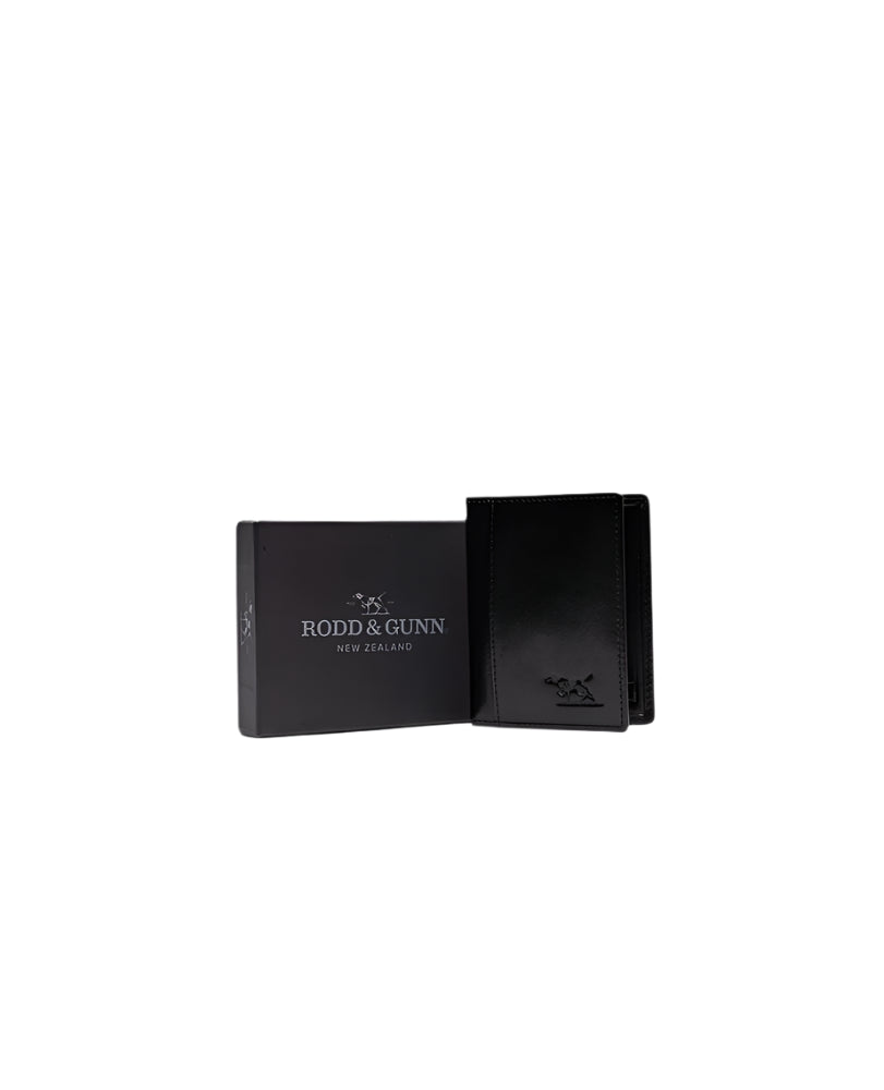 Black leather wallet with 'Rodd & Gunn' branding on a white background